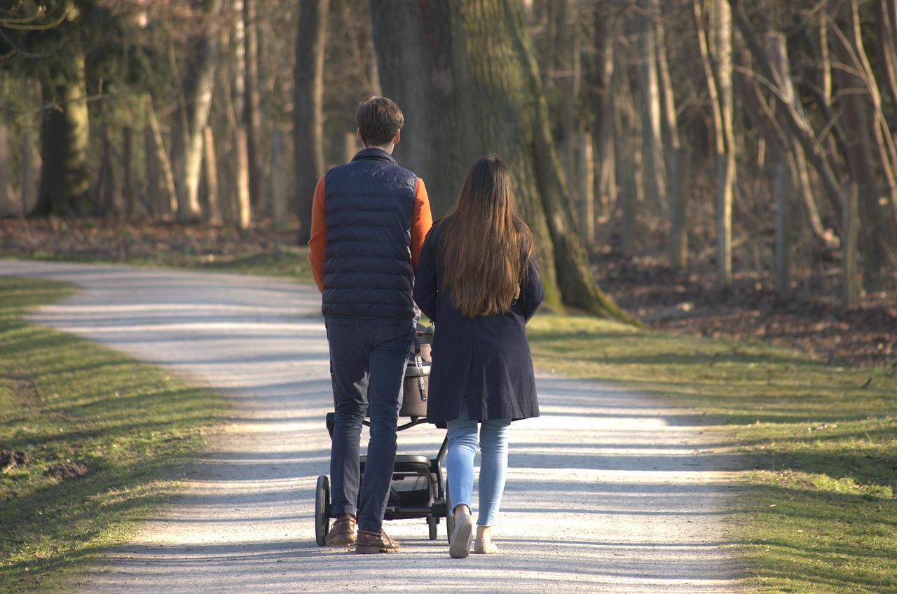 couple walking stroller